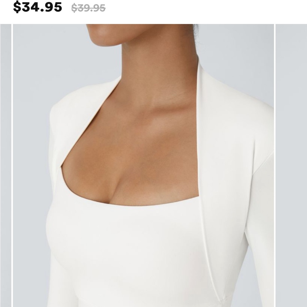 NWT Halara crop top sport with thumb holes. Buttery white with pads and support